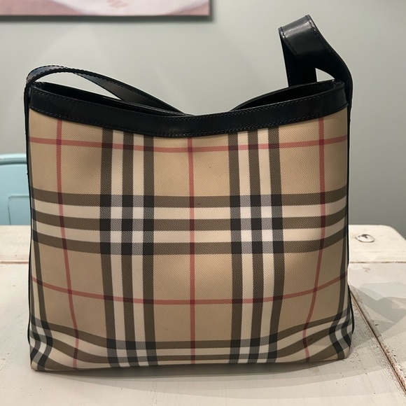 Like new Burberry Purse London. Very tiny mark near very bottom of bag. - Picture 3 of 5